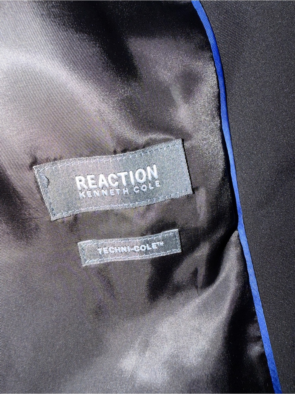 Black Men's Jacket with White Care Tag